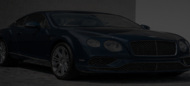 Dark blue luxury Bentley Continental GT coupe